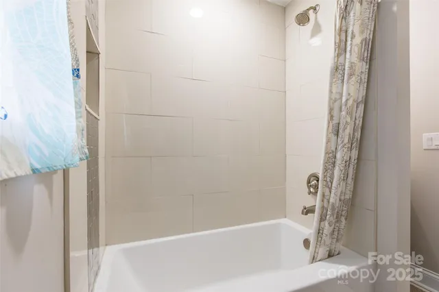 a bathroom with a bathtub