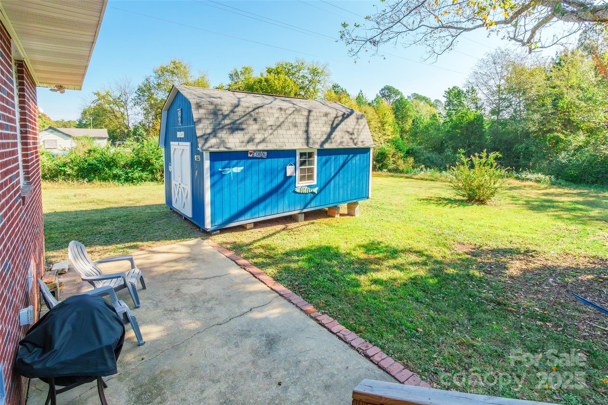 749 Meadowbrook Road Chester, SC 29706 - Photo 24 of 33 a view of a backyard with plants