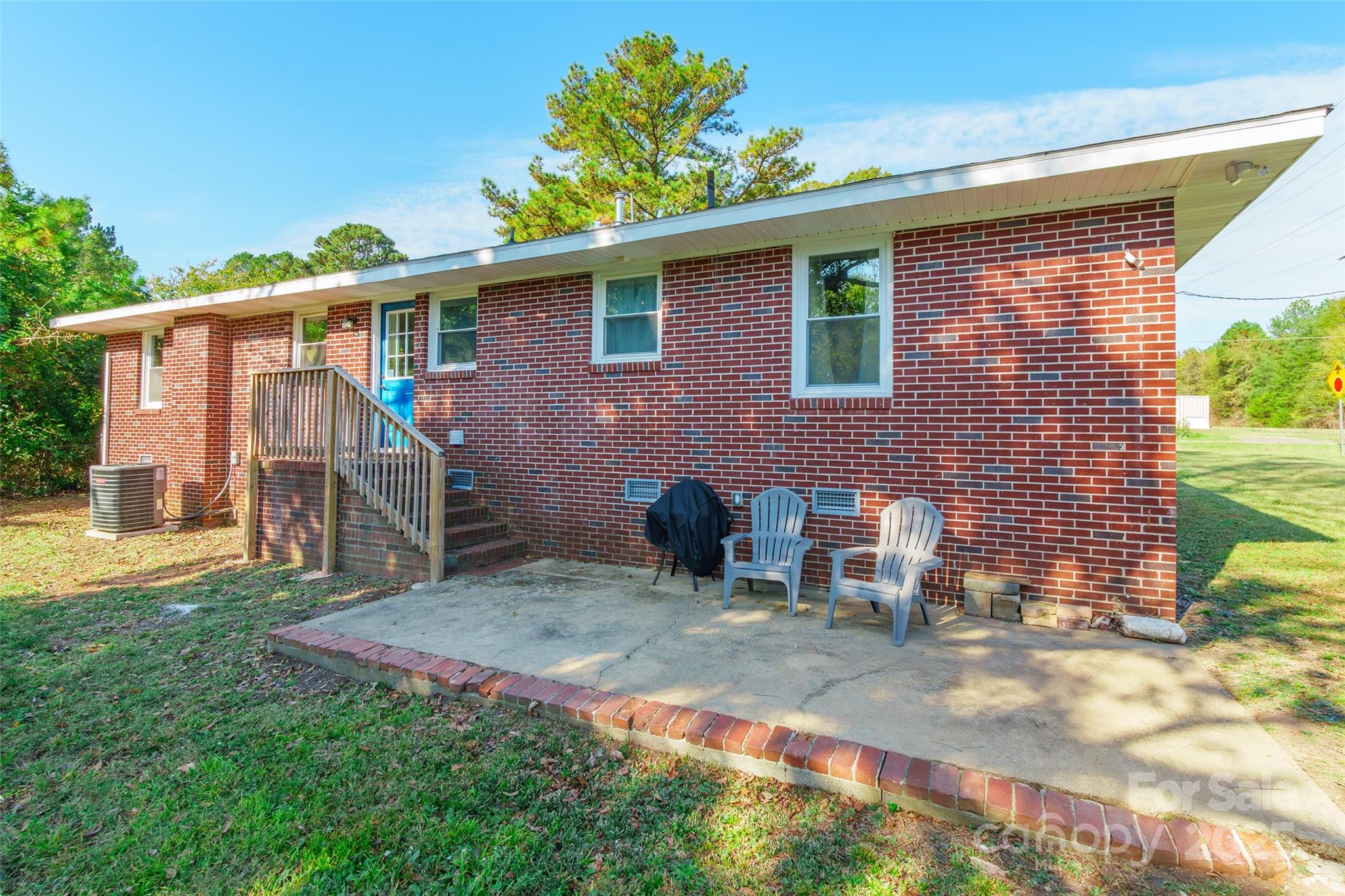 749 Meadowbrook Road Chester, SC 29706 - Photo 26 of 33 a view of a house with backyard and sitting area