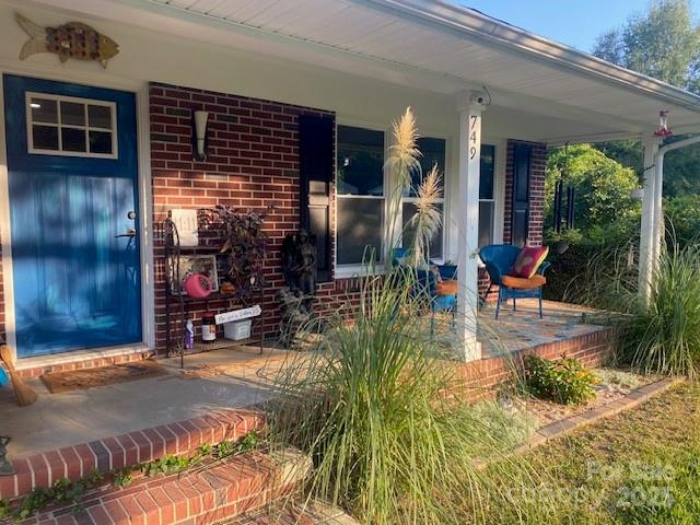 749 Meadowbrook Road Chester, SC 29706 - Photo 32 of 33 a view of living room with patio furniture and floor to ceiling window