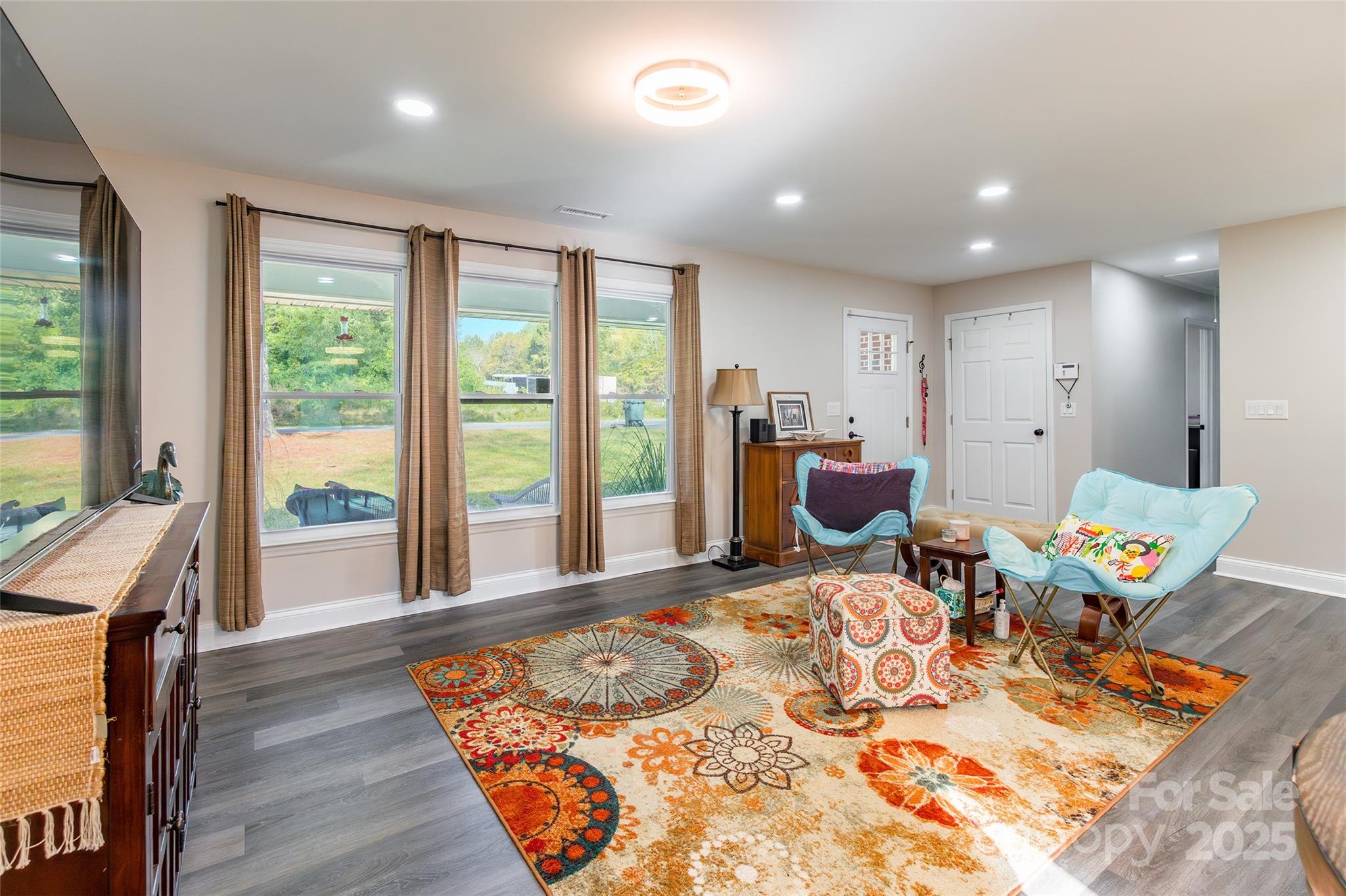 749 Meadowbrook Road Chester, SC 29706 - Photo 7 of 33 a bedroom with a bed and wooden floor