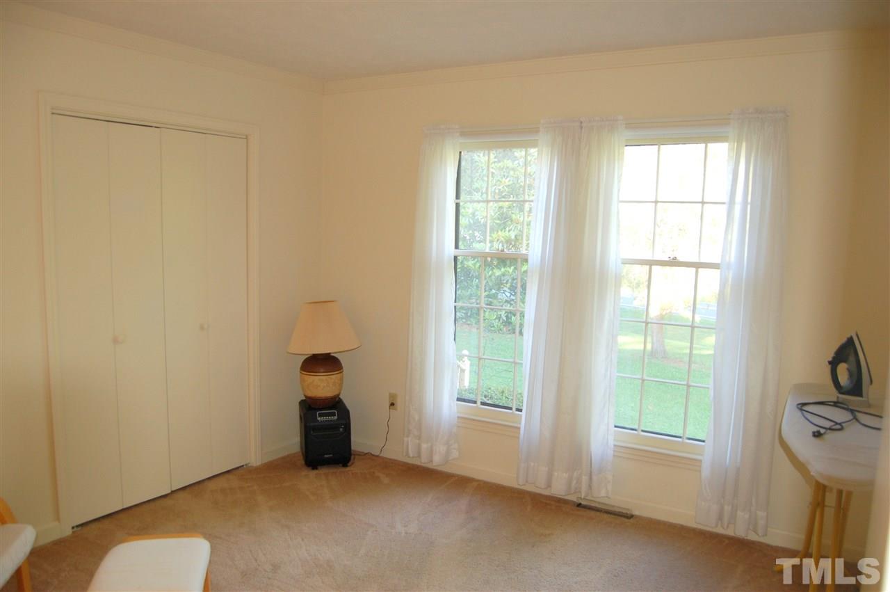 6109 Russell Road Durham, NC 27712 - Photo 14 of 25 a room with window and walk in closet