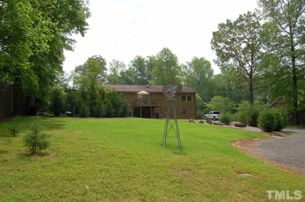 6109 Russell Road Durham, NC 27712 - Photo 21 of 25 a view of a backyard with a trampoline