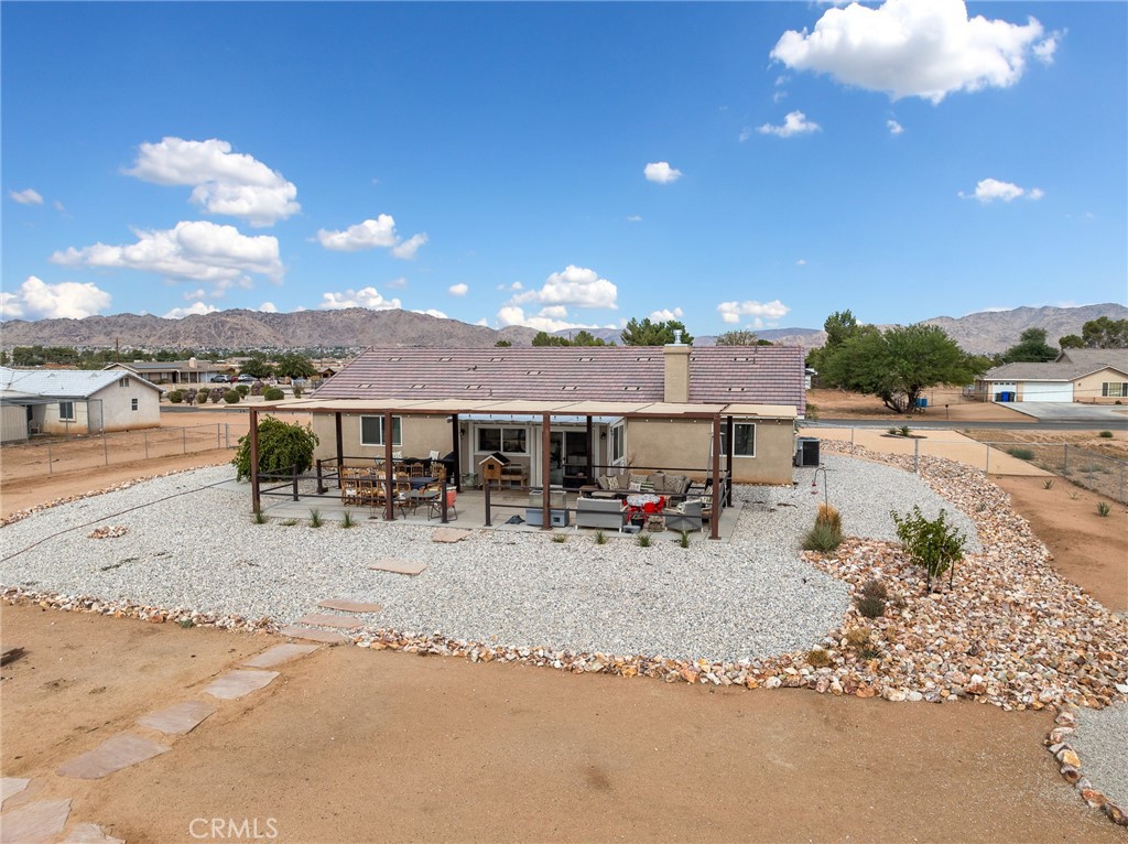 15620 Erie Road Apple Valley, CA 92307 - Photo 39 of 53 a view of a lake with a table and chairs