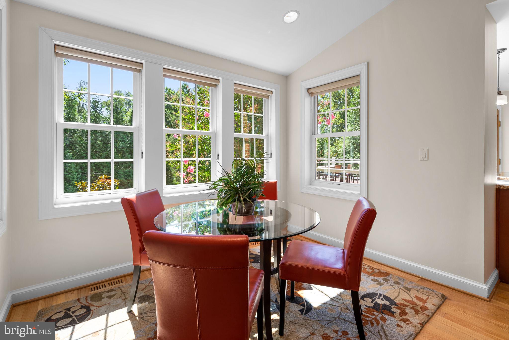 9601 Sutherland Road Silver Spring, MD 20901 - Photo 17 of 48 a dining room with furniture and wooden floor