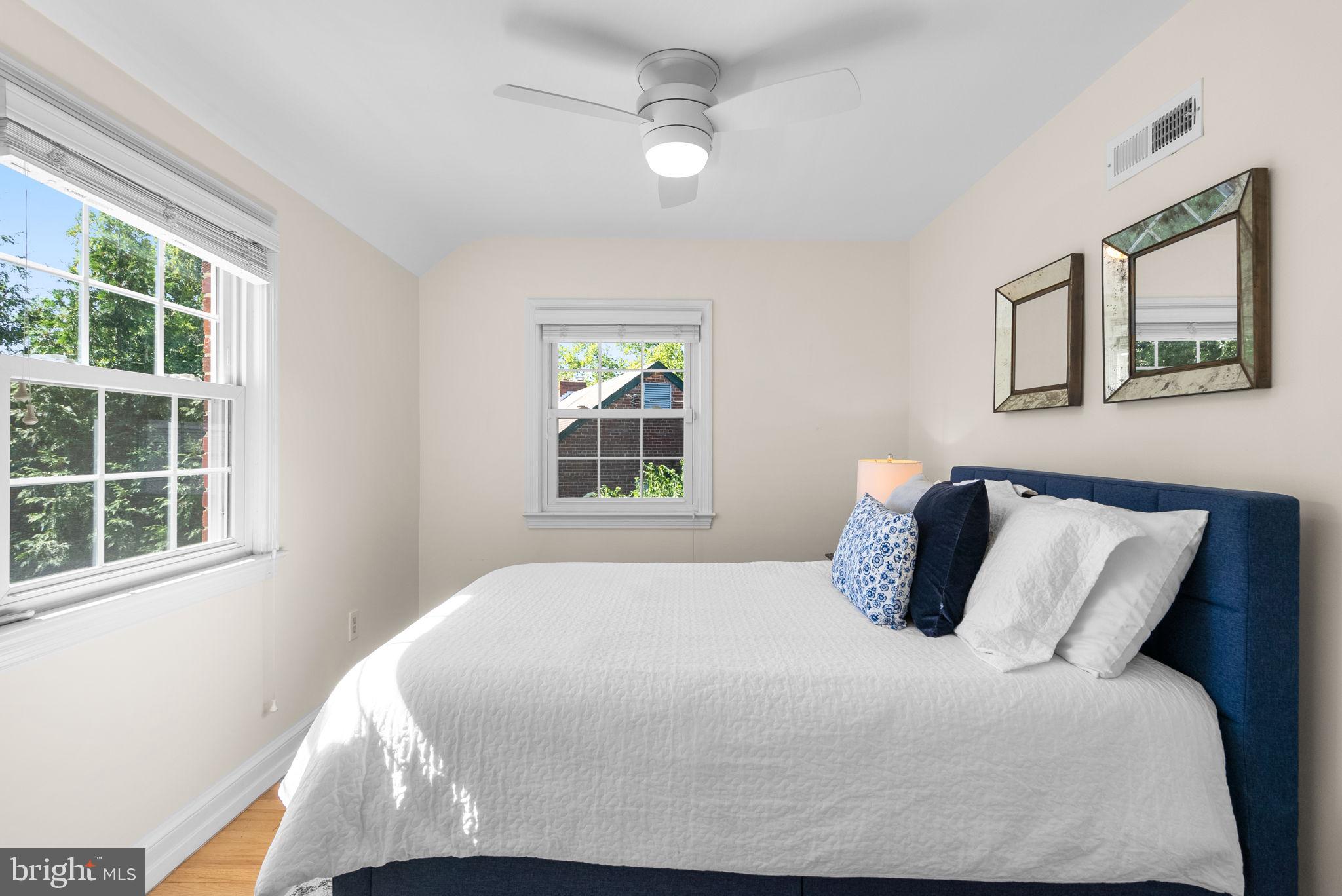 9601 Sutherland Road Silver Spring, MD 20901 - Photo 27 of 48 a bedroom with a bed and a window