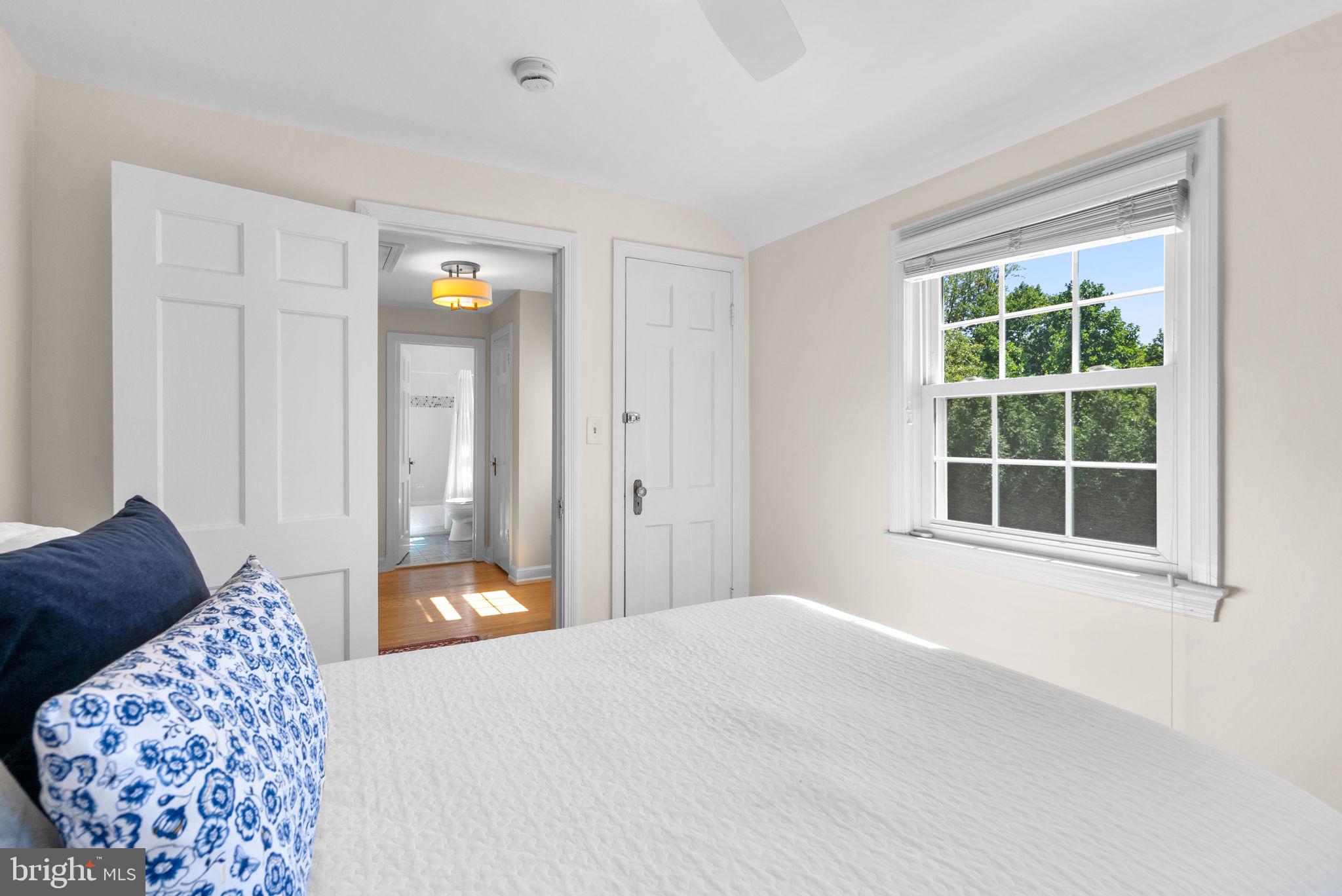 9601 Sutherland Road Silver Spring, MD 20901 - Photo 28 of 48 a bedroom with a bed and a window