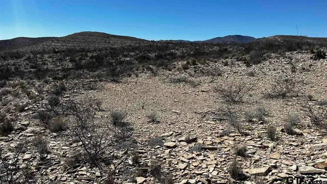 a view of mountains and valleys