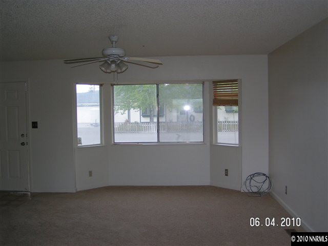 3450 Canvasback Lane Reno, NV 89508 - Photo 3 of 6 an empty room with windows