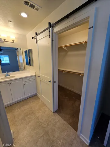 a bathroom with a tub and a shower