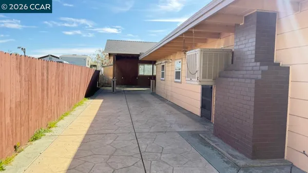 a view of a room with wooden walls