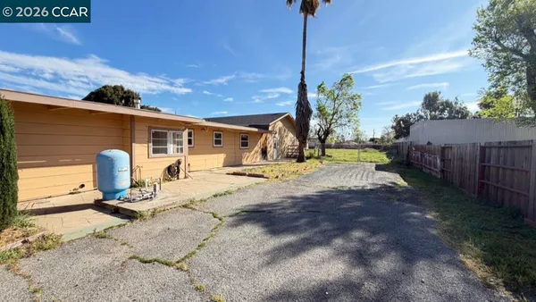 a view of a yard with an outdoor space