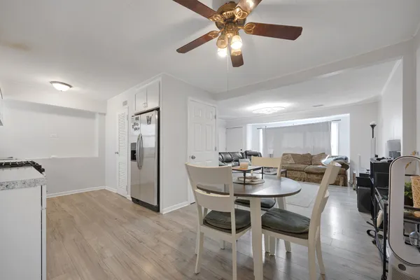 a view of a dining room with furniture