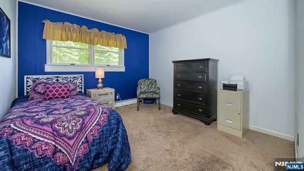 277 French Hill Road Wayne, NJ 07470 - Photo 18 of 28 a bedroom with a bed and a dresser