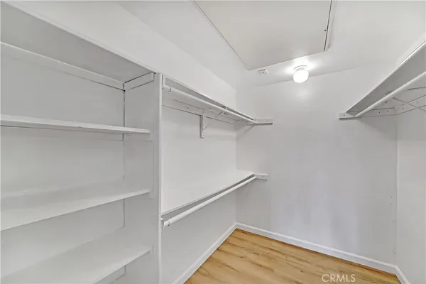 a view of an empty walk in closet