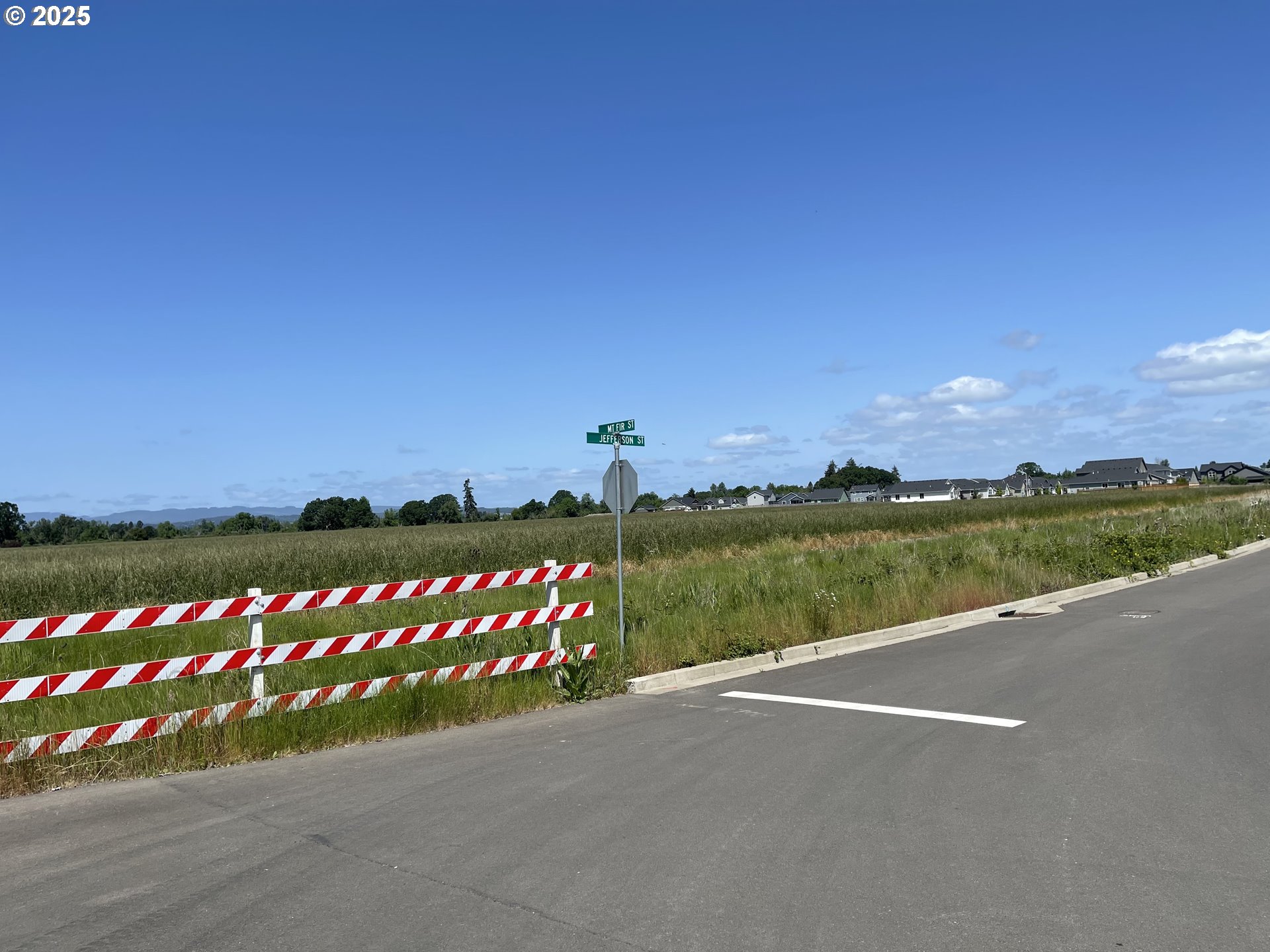 0 Jefferson Street Independence, OR 97351 - Photo 2 of 7 a view of a lake with a houses