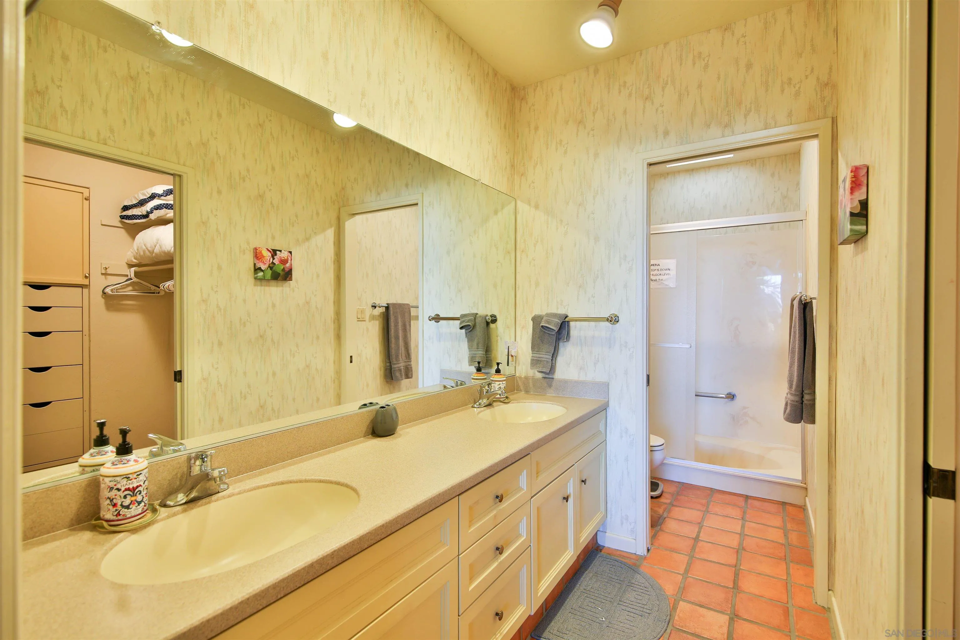 1921 Desert Vista Terrace Borrego Springs, CA 92004 - Photo 13 of 19 a spacious bathroom with a granite countertop tub sink and mirror