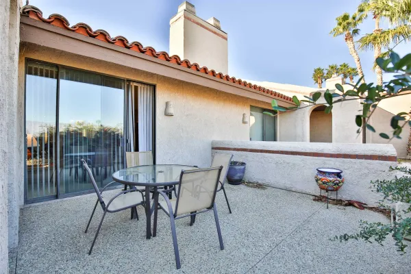 a aerial view of a house with a yard patio and swimming pool