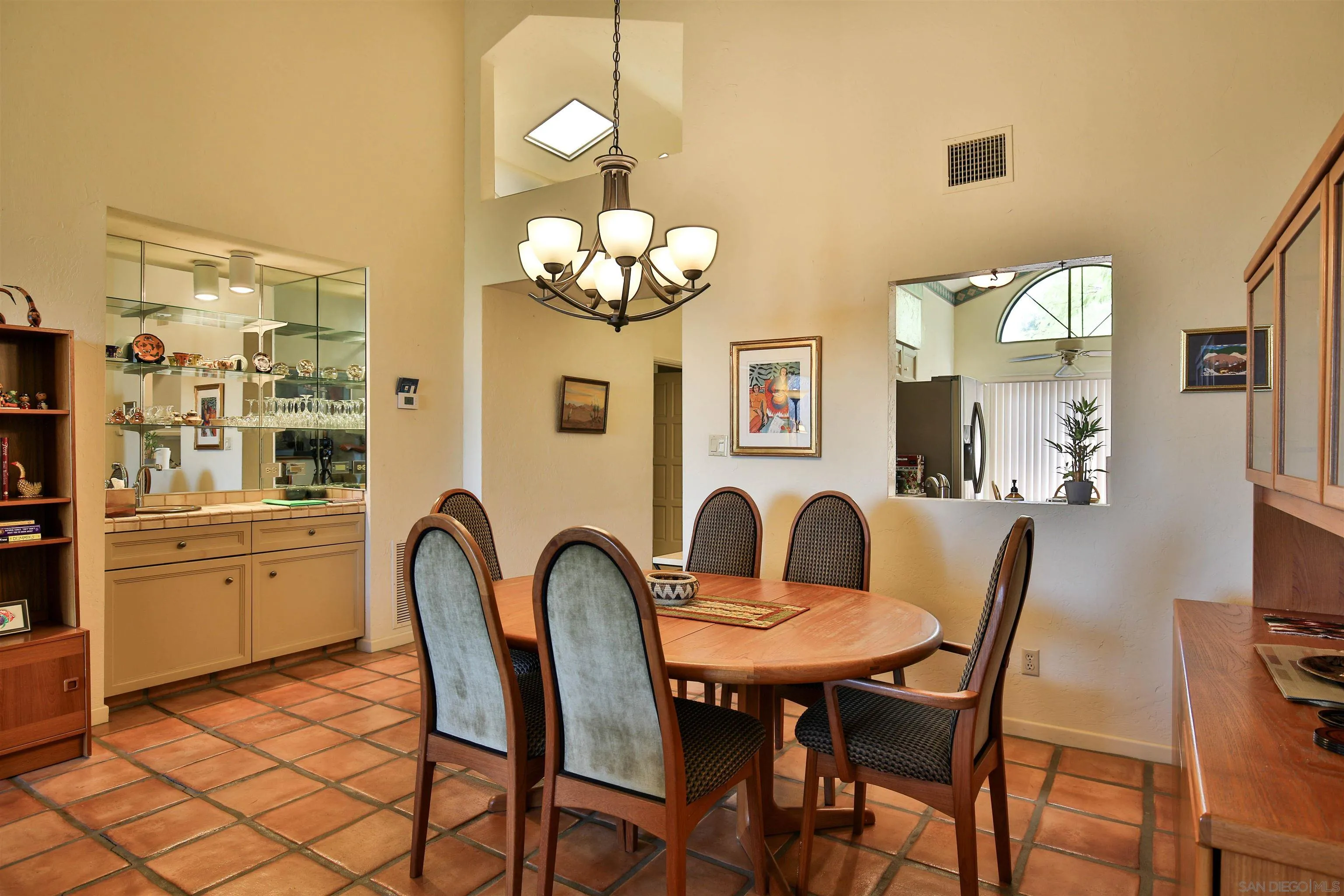 1921 Desert Vista Terrace Borrego Springs, CA 92004 - Photo 8 of 19 a dining room filled chandelier and wooden floor