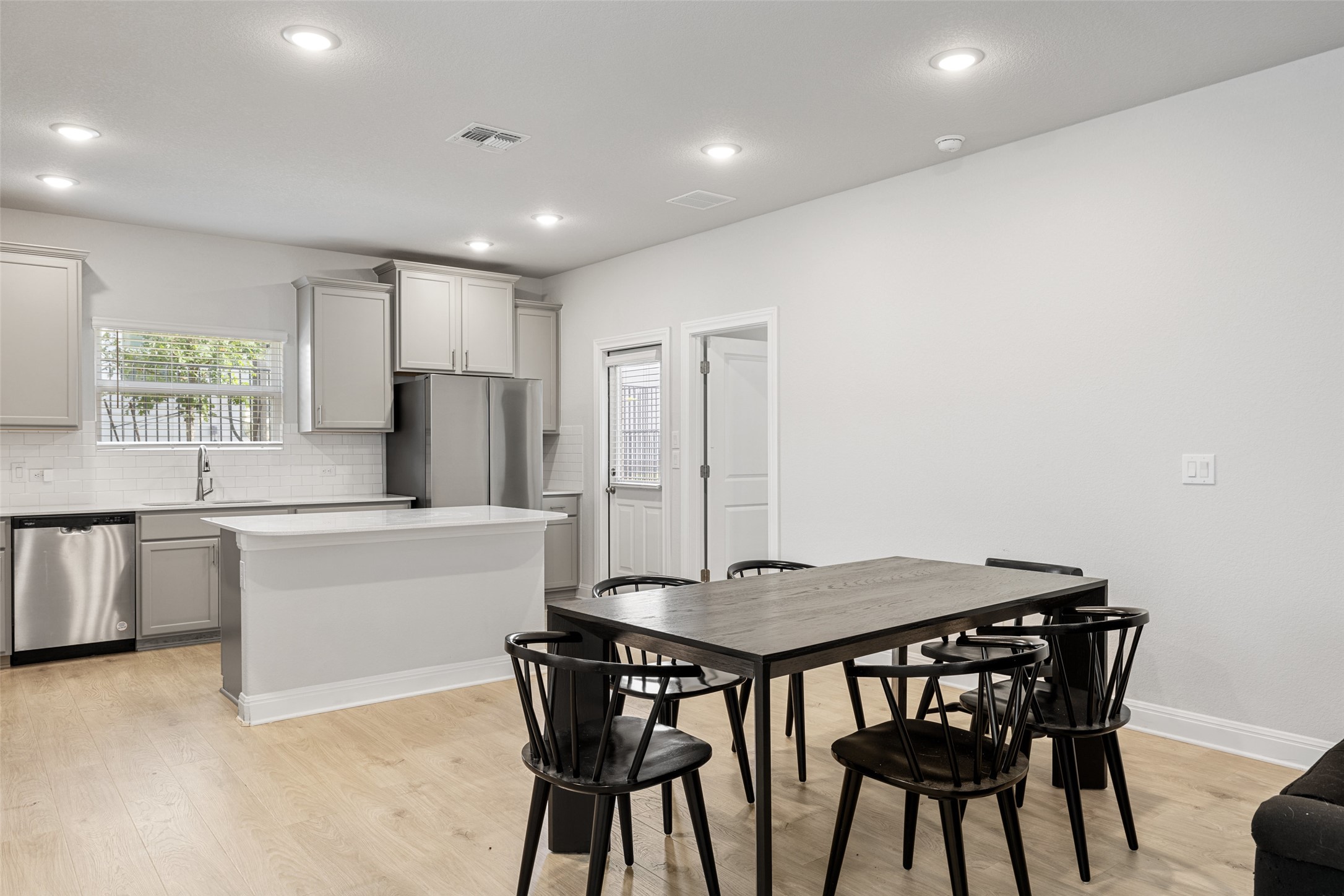 1012 Legend Milton Lane Austin, TX 78748 - Photo 11 of 30 a kitchen with a table and chairs in it
