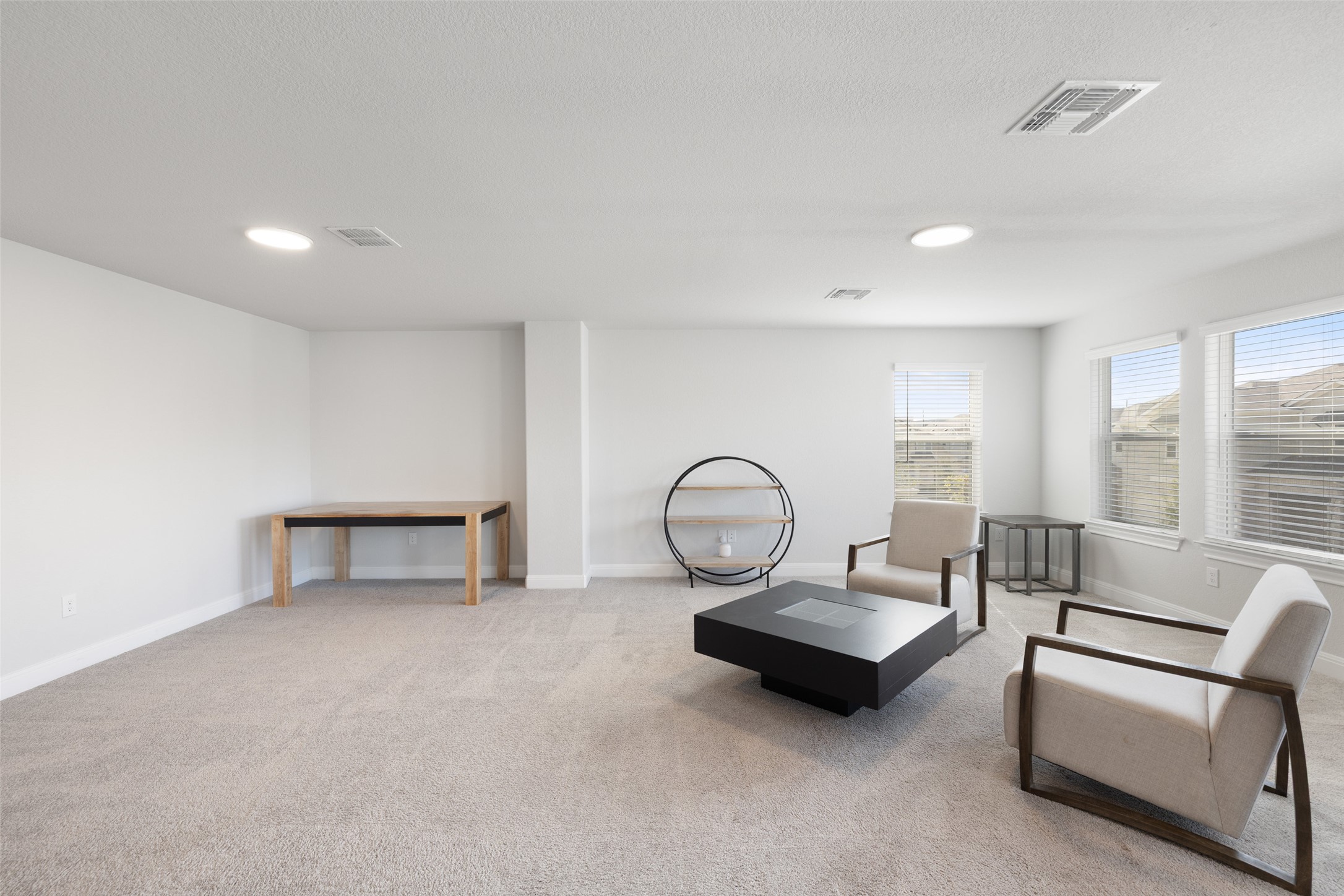 1012 Legend Milton Lane Austin, TX 78748 - Photo 18 of 30 a living room with furniture and a floor to ceiling window
