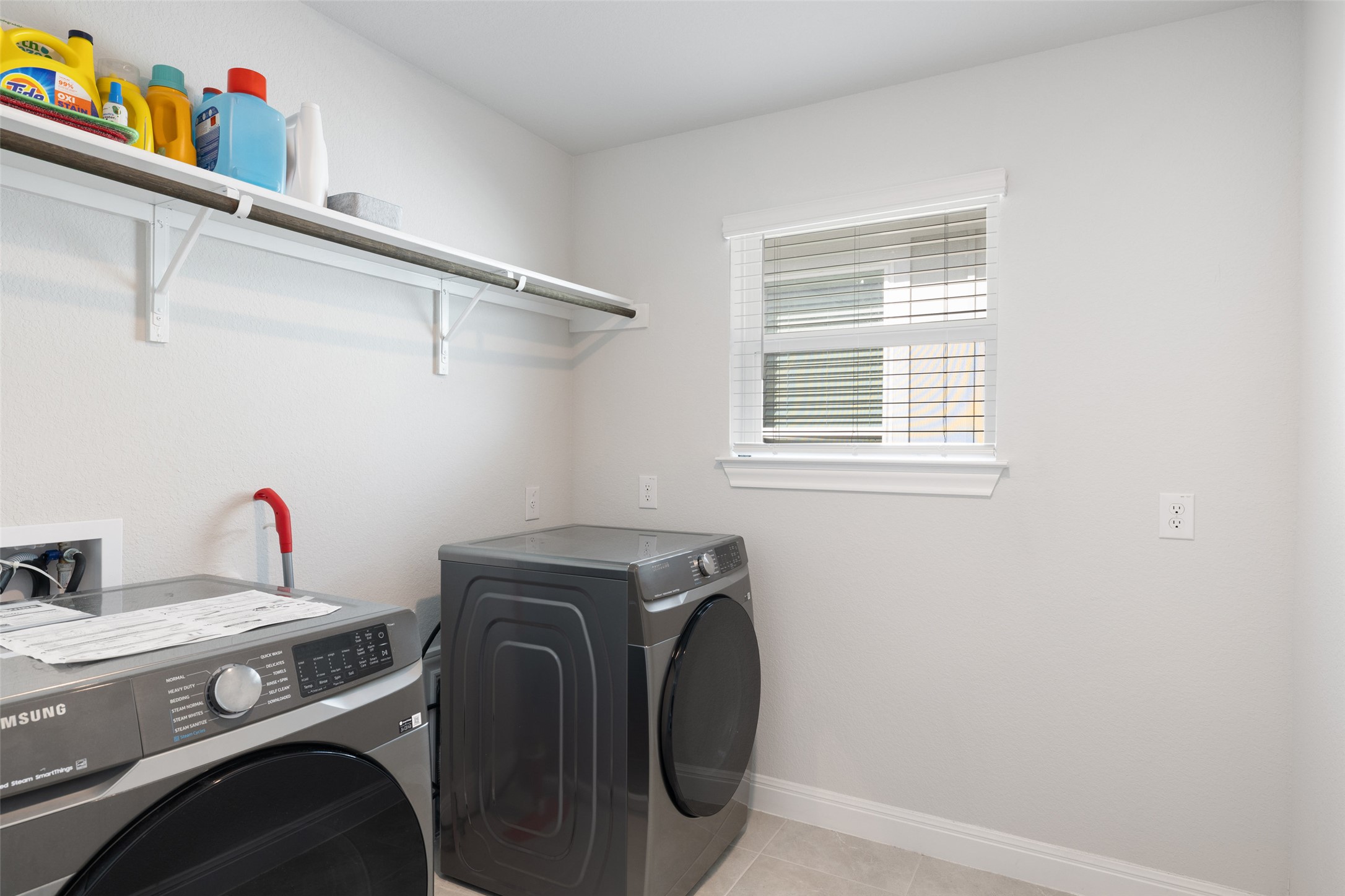 1012 Legend Milton Lane Austin, TX 78748 - Photo 20 of 30 a utility room with dryer and washer