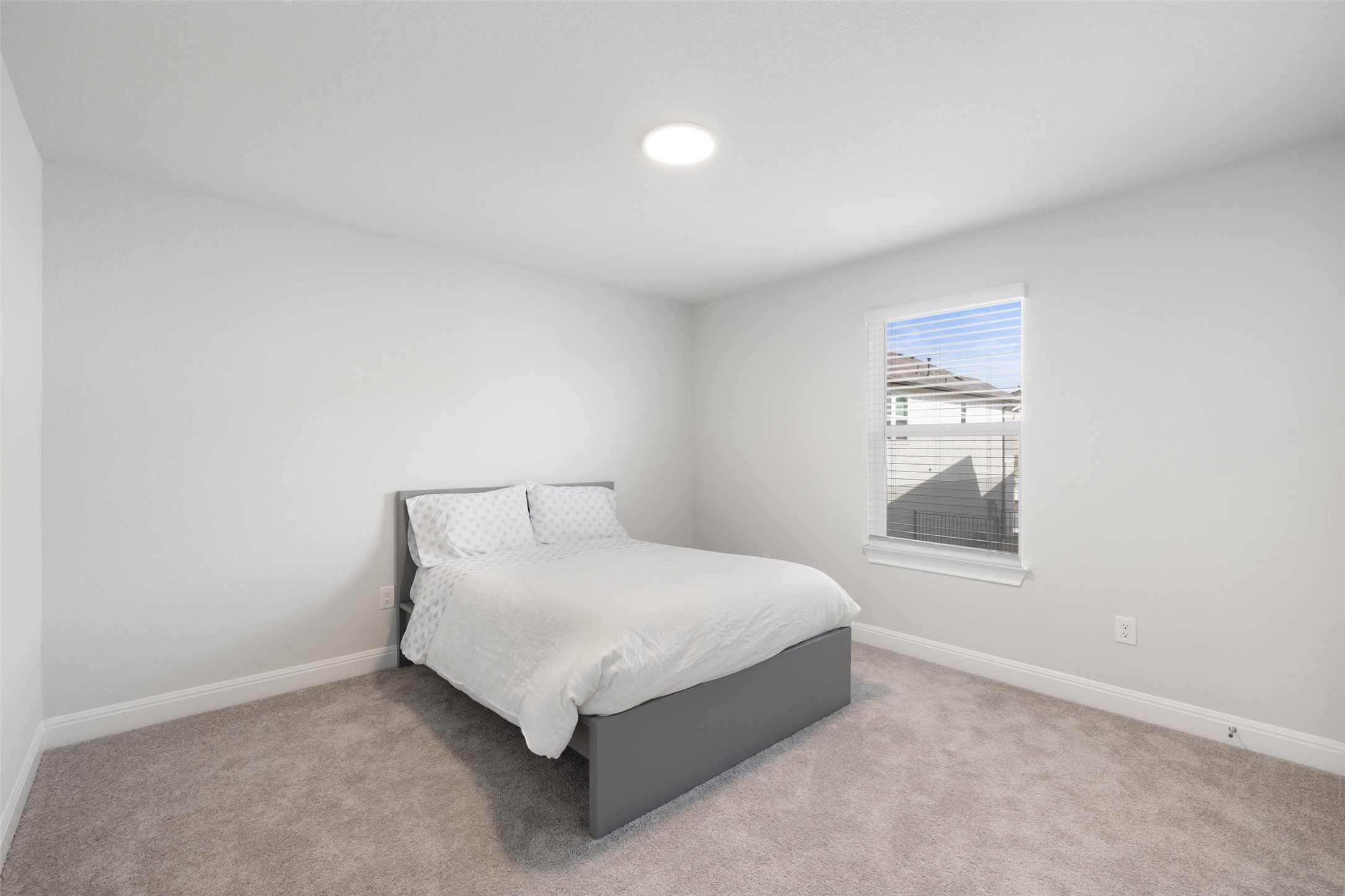 1012 Legend Milton Lane Austin, TX 78748 - Photo 24 of 30 a bedroom with a bed and a window