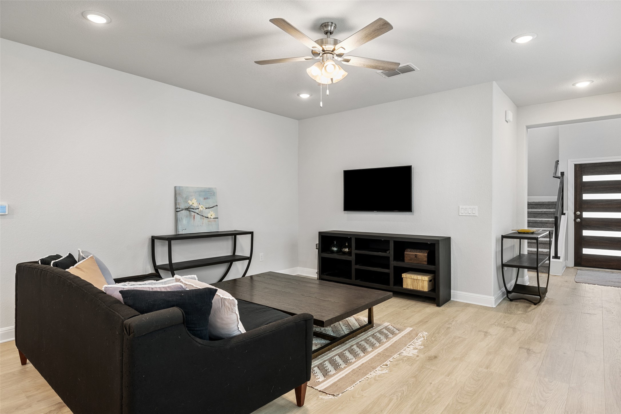 1012 Legend Milton Lane Austin, TX 78748 - Photo 5 of 30 a living room with furniture and a flat screen tv