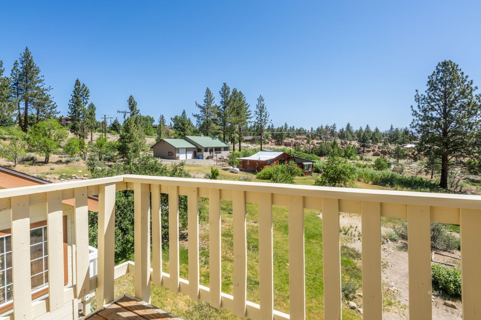 67 Willow Road Swall Meadows, CA 93514 - Photo 17 of 35 a view of a balcony with outdoor space