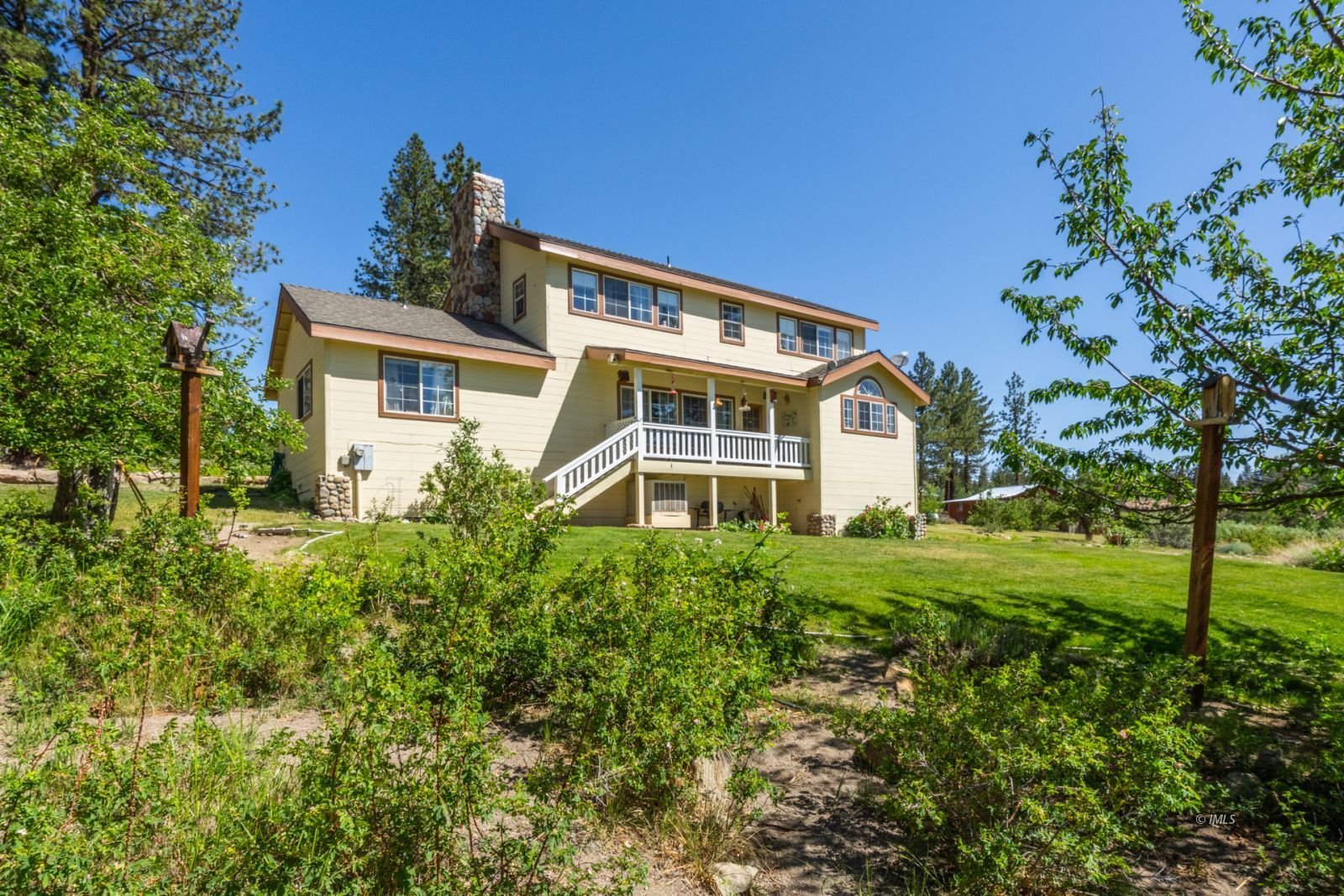 67 Willow Road Swall Meadows, CA 93514 - Photo 24 of 35 a front view of a house with a yard