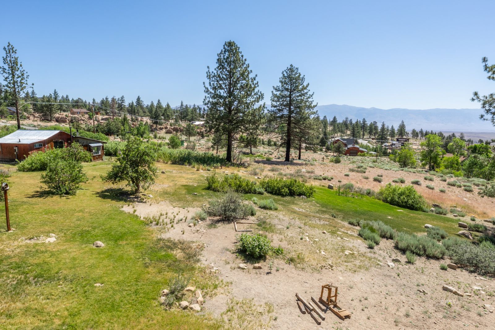 67 Willow Road Swall Meadows, CA 93514 - Photo 32 of 35 a view of a large yard with lots of green space