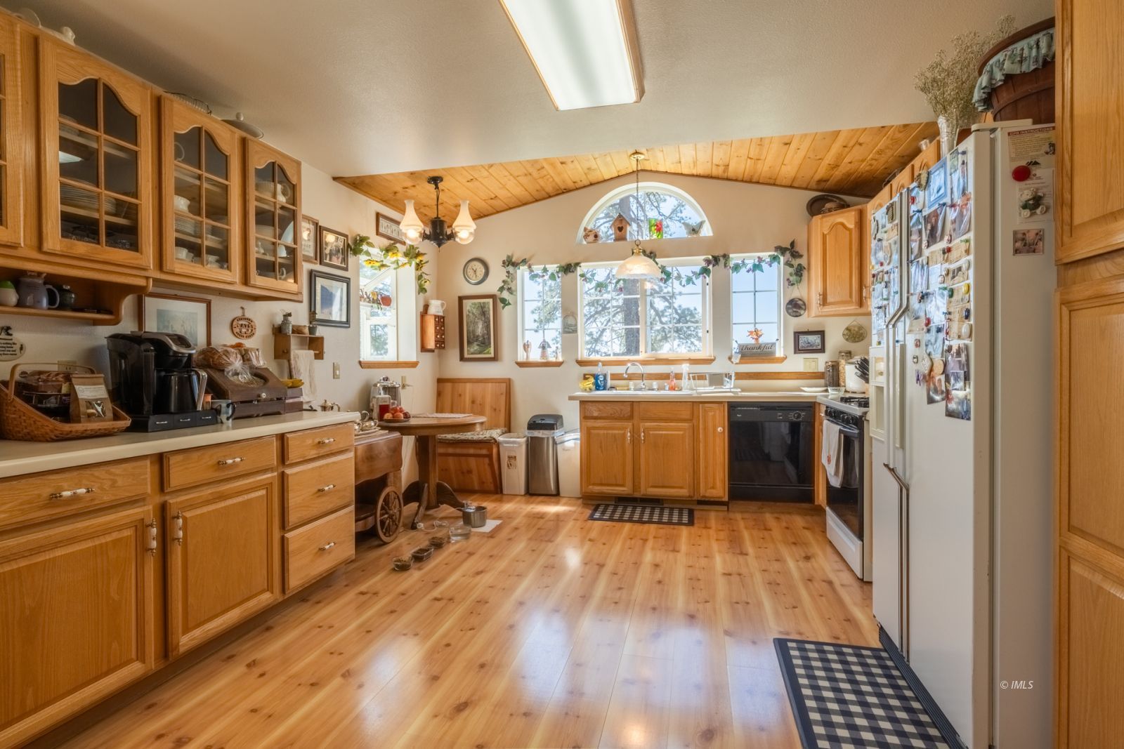 67 Willow Road Swall Meadows, CA 93514 - Photo 6 of 35 a kitchen with a sink stove and cabinets