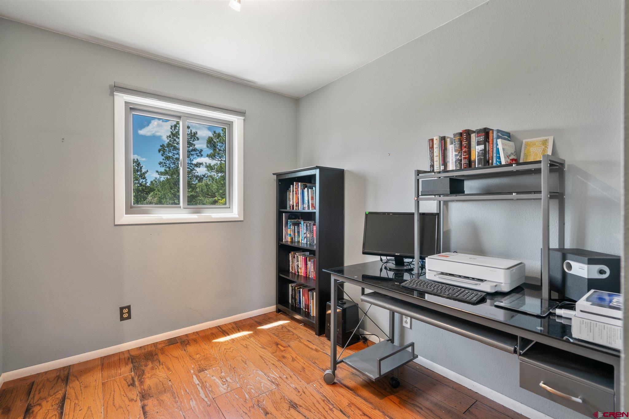 150 Pine Road Durango, CO 81303 - Photo 13 of 35 a view of a workspace with furniture and a window