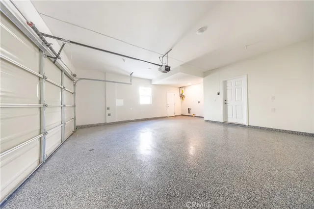 a view of a livingroom with wooden floor