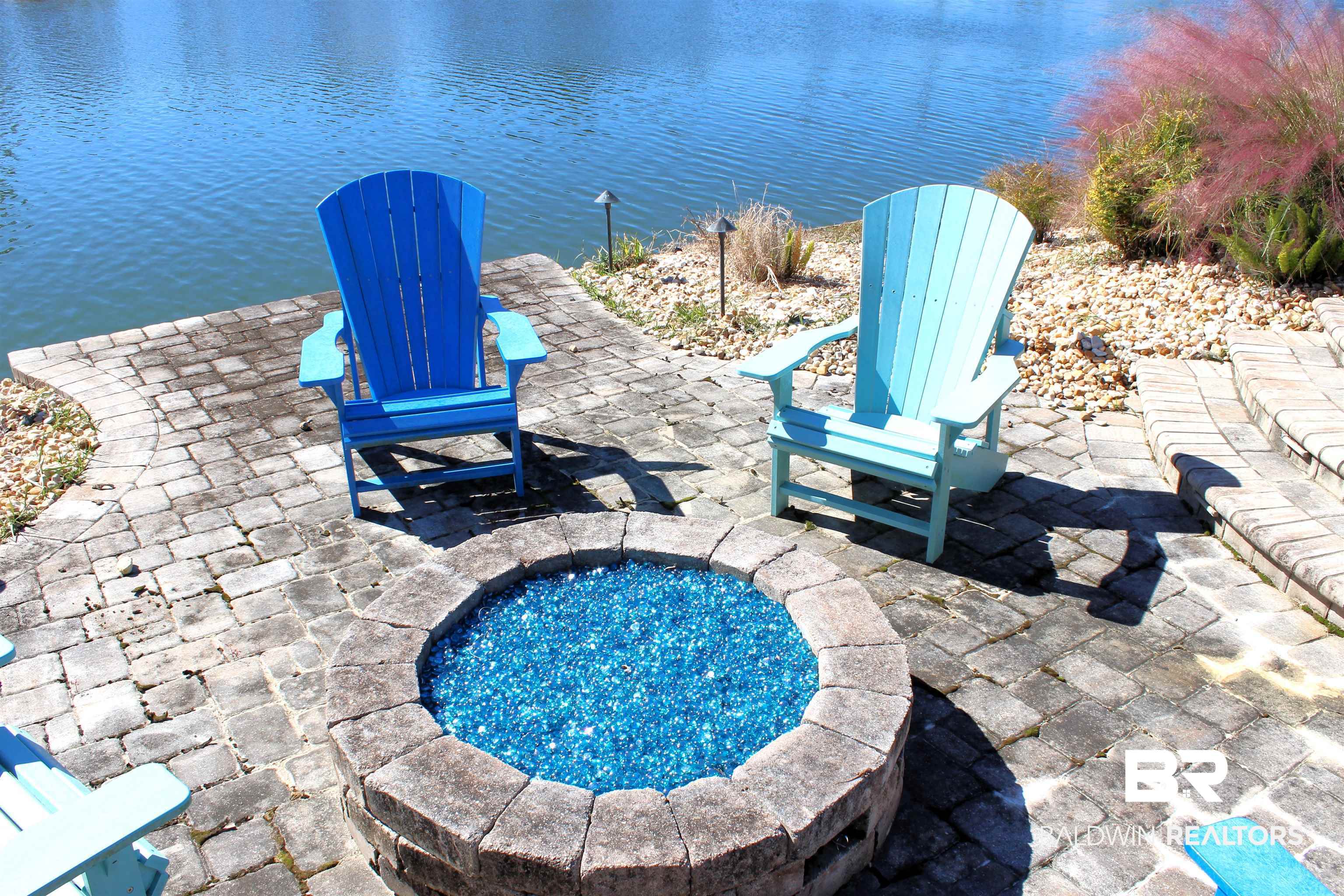 28152 Migratory Way Elberta, AL 36530 - Photo 11 of 54 View of swimming pool featuring a water view and a patio area