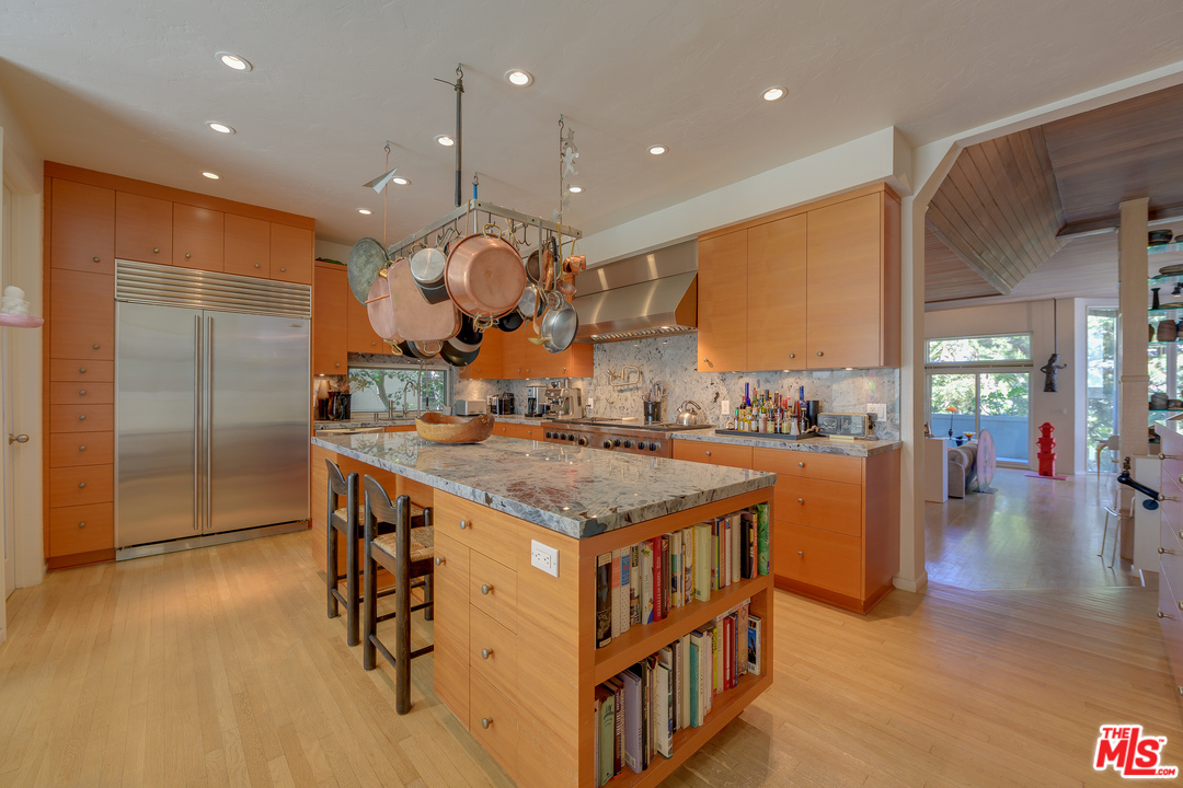 16 Westwind Street Marina del Rey, CA 90292 - Photo 12 of 40 a kitchen with stainless steel appliances granite countertop a stove and a refrigerator