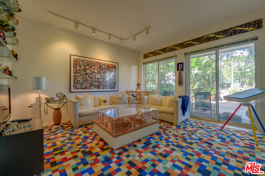 16 Westwind Street Marina del Rey, CA 90292 - Photo 27 of 40 a living room with furniture a rug and a large window