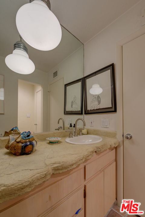 16 Westwind Street Marina del Rey, CA 90292 - Photo 33 of 40 a bathroom with a sink and a mirror