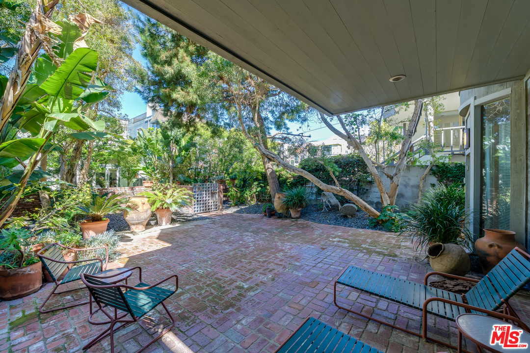 16 Westwind Street Marina del Rey, CA 90292 - Photo 34 of 40 a view of a porch with furniture and a yard
