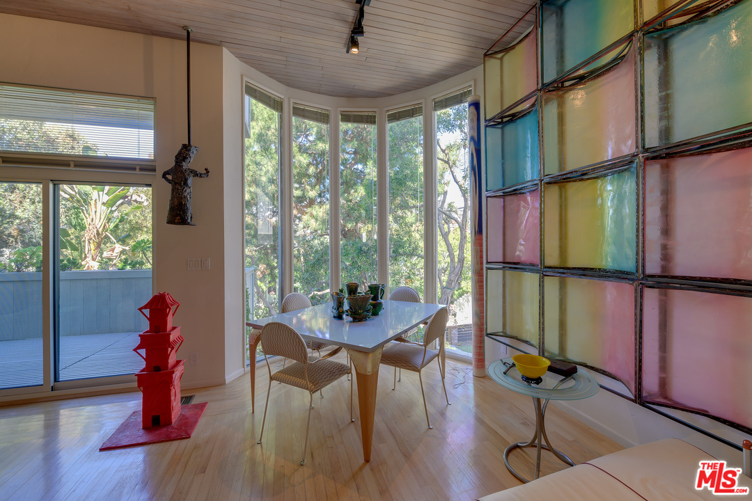 16 Westwind Street Marina del Rey, CA 90292 - Photo 5 of 40 a view of a dining room with furniture window and wooden floor