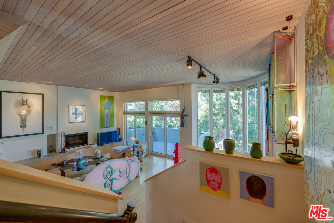 16 Westwind Street Marina del Rey, CA 90292 - Photo 6 of 40 a living room with furniture and a large window