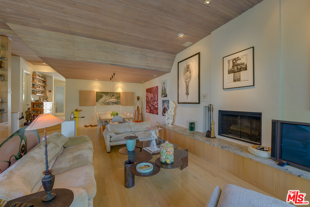 16 Westwind Street Marina del Rey, CA 90292 - Photo 9 of 40 a living room with furniture and a fireplace