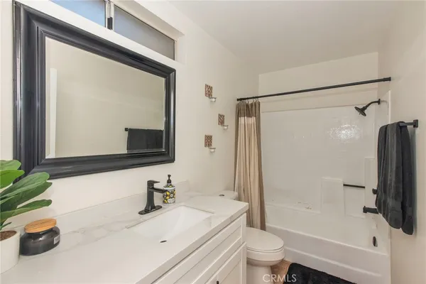 a bed room with furniture and decor