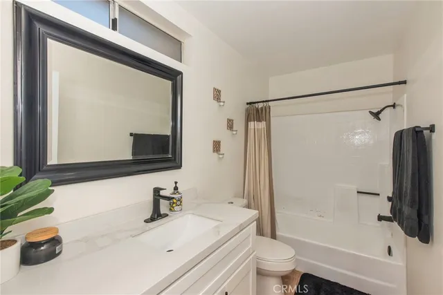 a bed room with furniture and decor