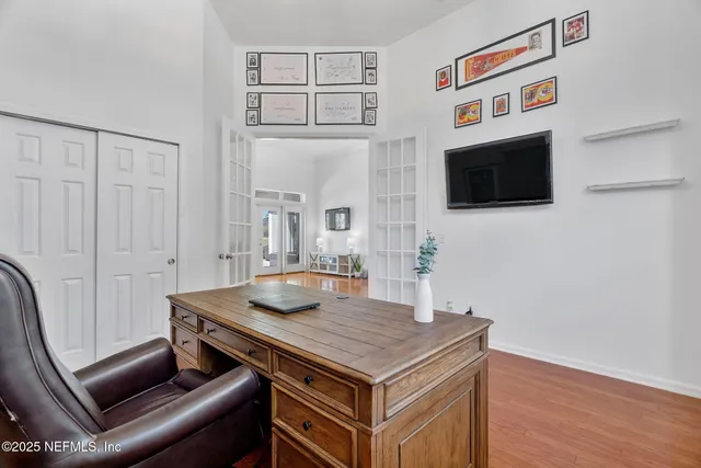 a bathroom with a toilet sink and shower