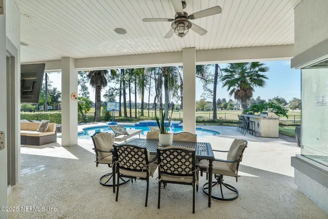 a view of a house with a swimming pool