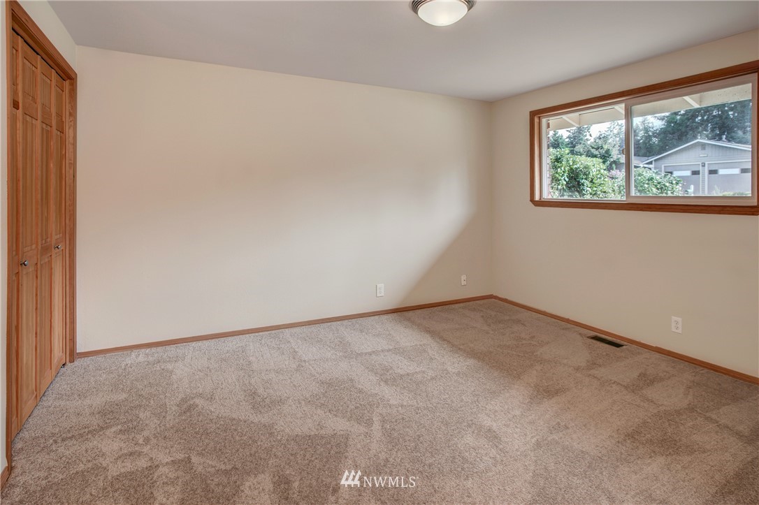 14437 157th Place Southeast Renton, WA 98059 - Photo 12 of 18 an empty room with windows