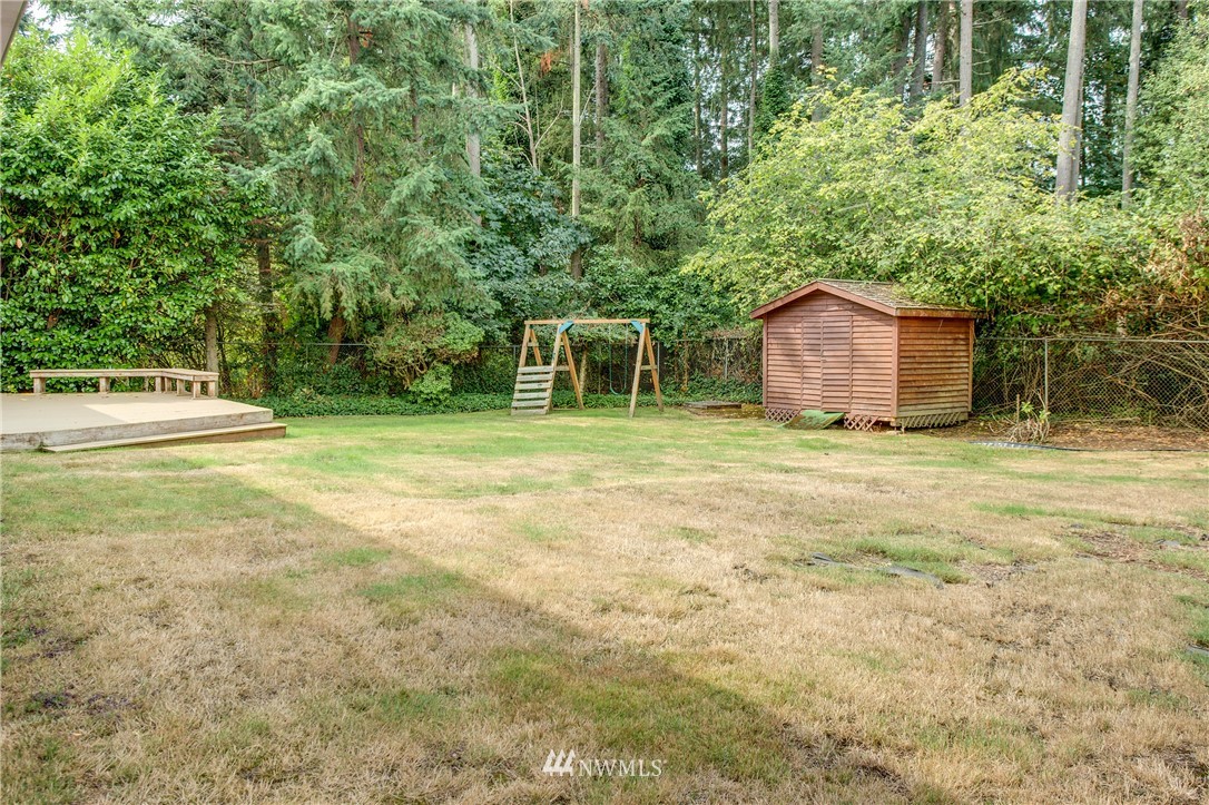 14437 157th Place Southeast Renton, WA 98059 - Photo 13 of 18 a house with a yard