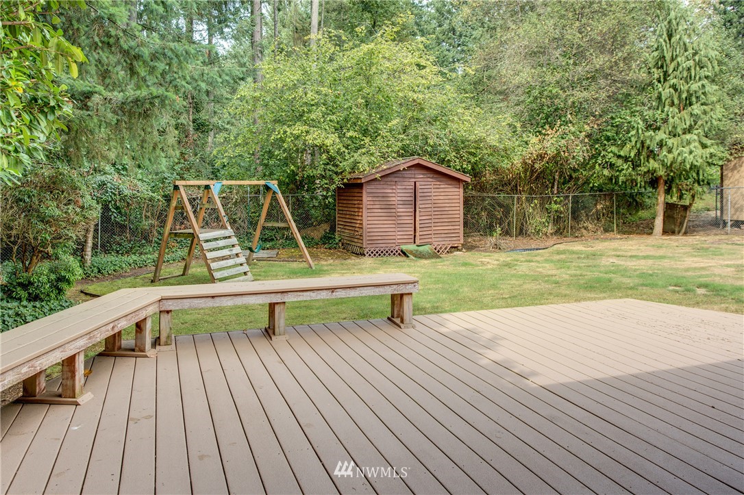 14437 157th Place Southeast Renton, WA 98059 - Photo 14 of 18 a park view with a bench