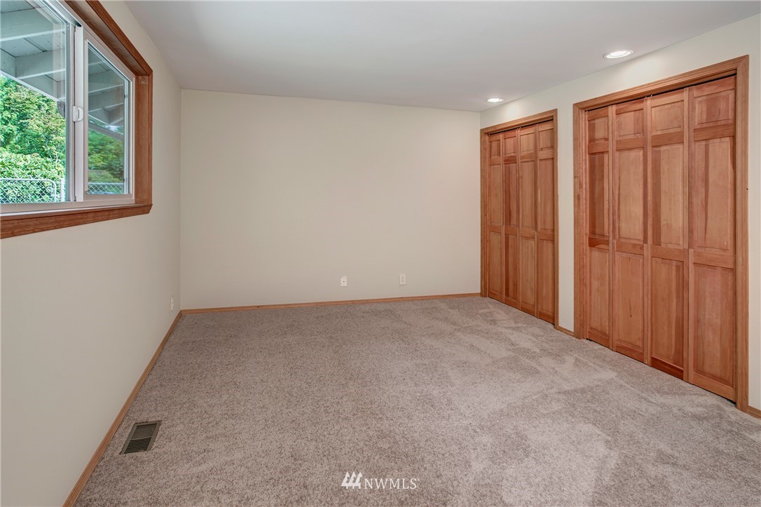 14437 157th Place Southeast Renton, WA 98059 - Photo 17 of 18 an empty room with windows